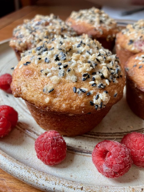 group of raspberry muffins on a plate