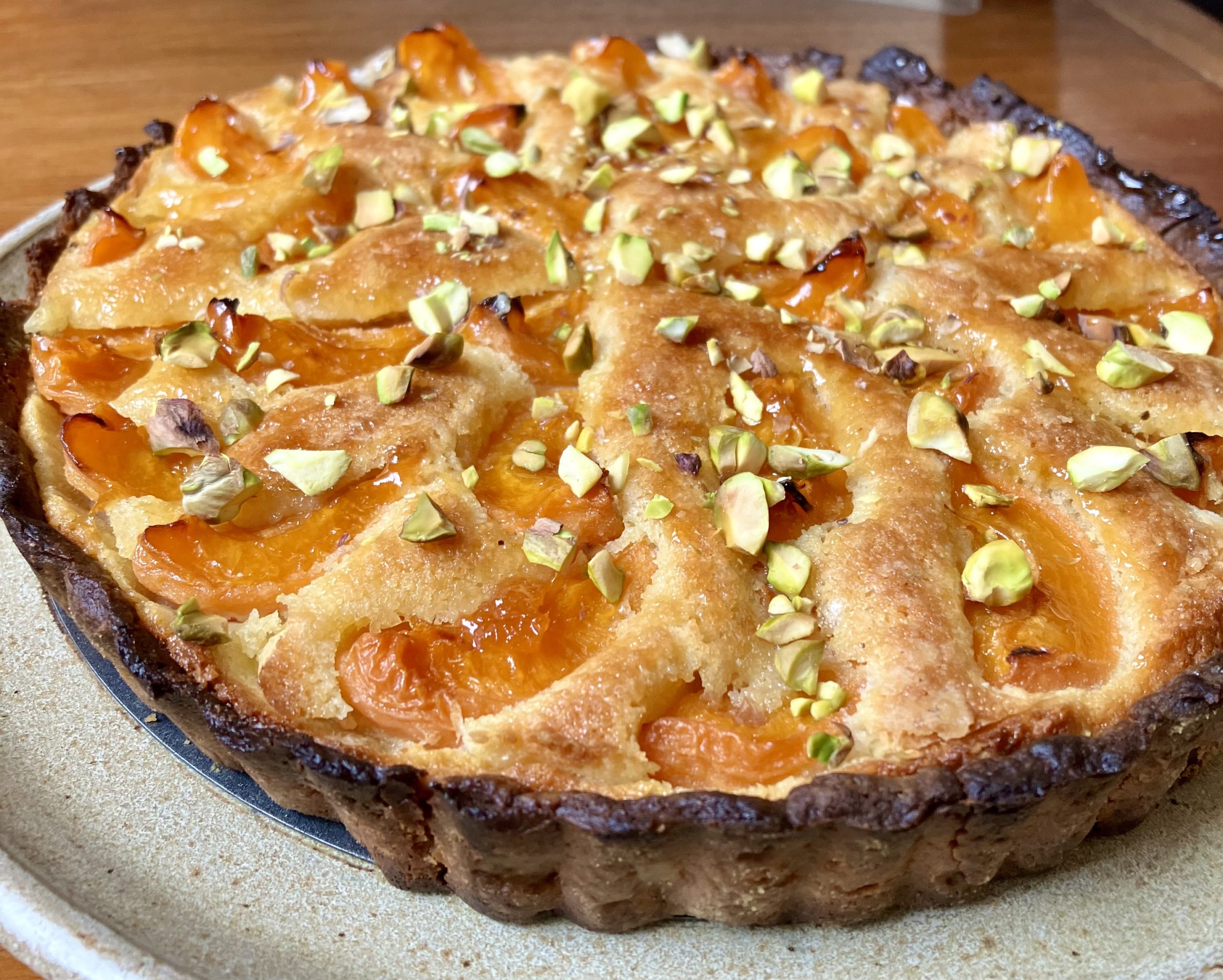 apricot frangipane tart on a plate