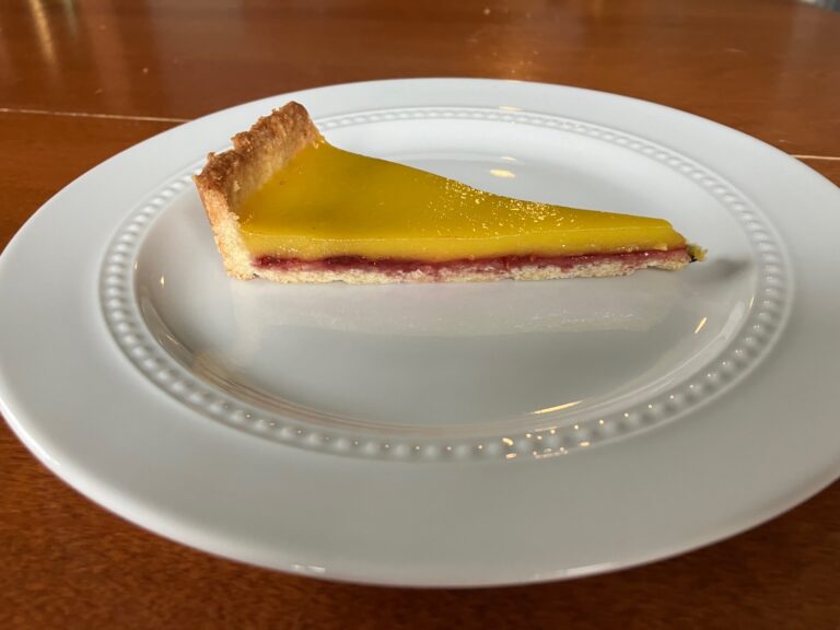 slice of lemon olive oil tart on a plate