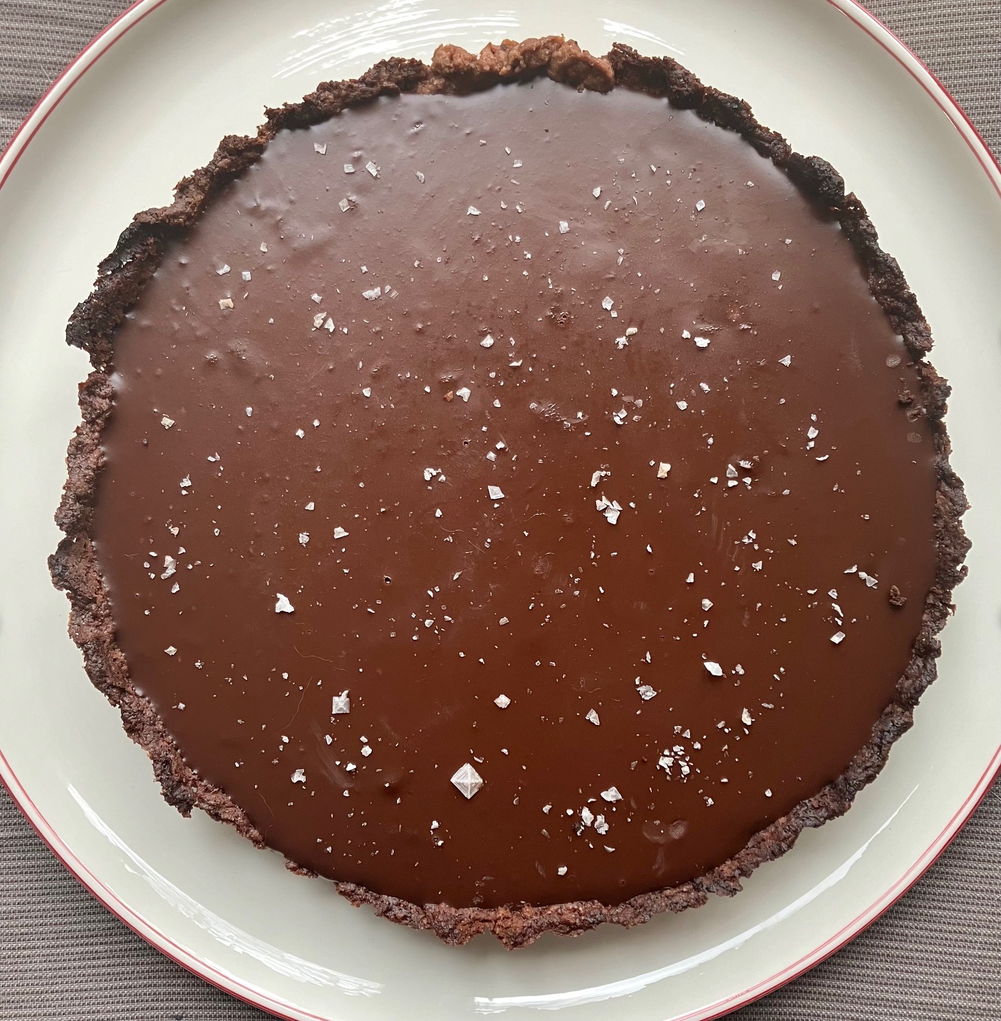 Chocolate coffee caramel tart on a plate