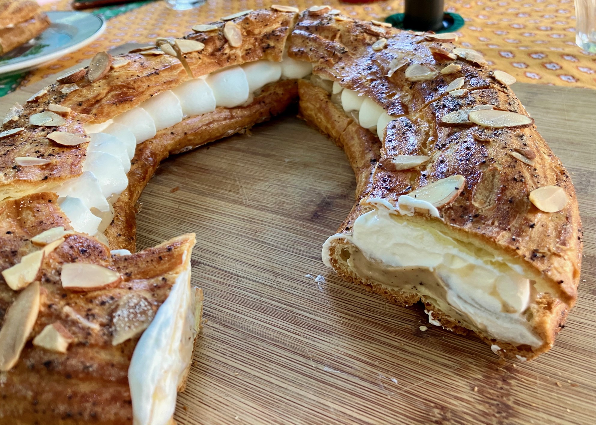 earl grey lavender paris brest with a slice removed