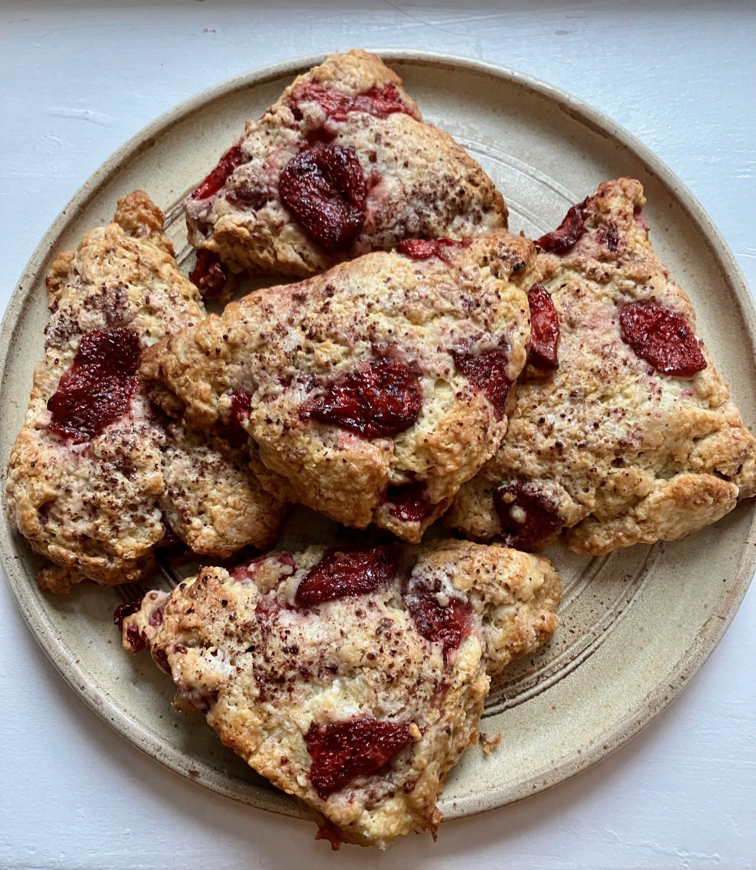 roasted strawberry scones with Sumac on a plate