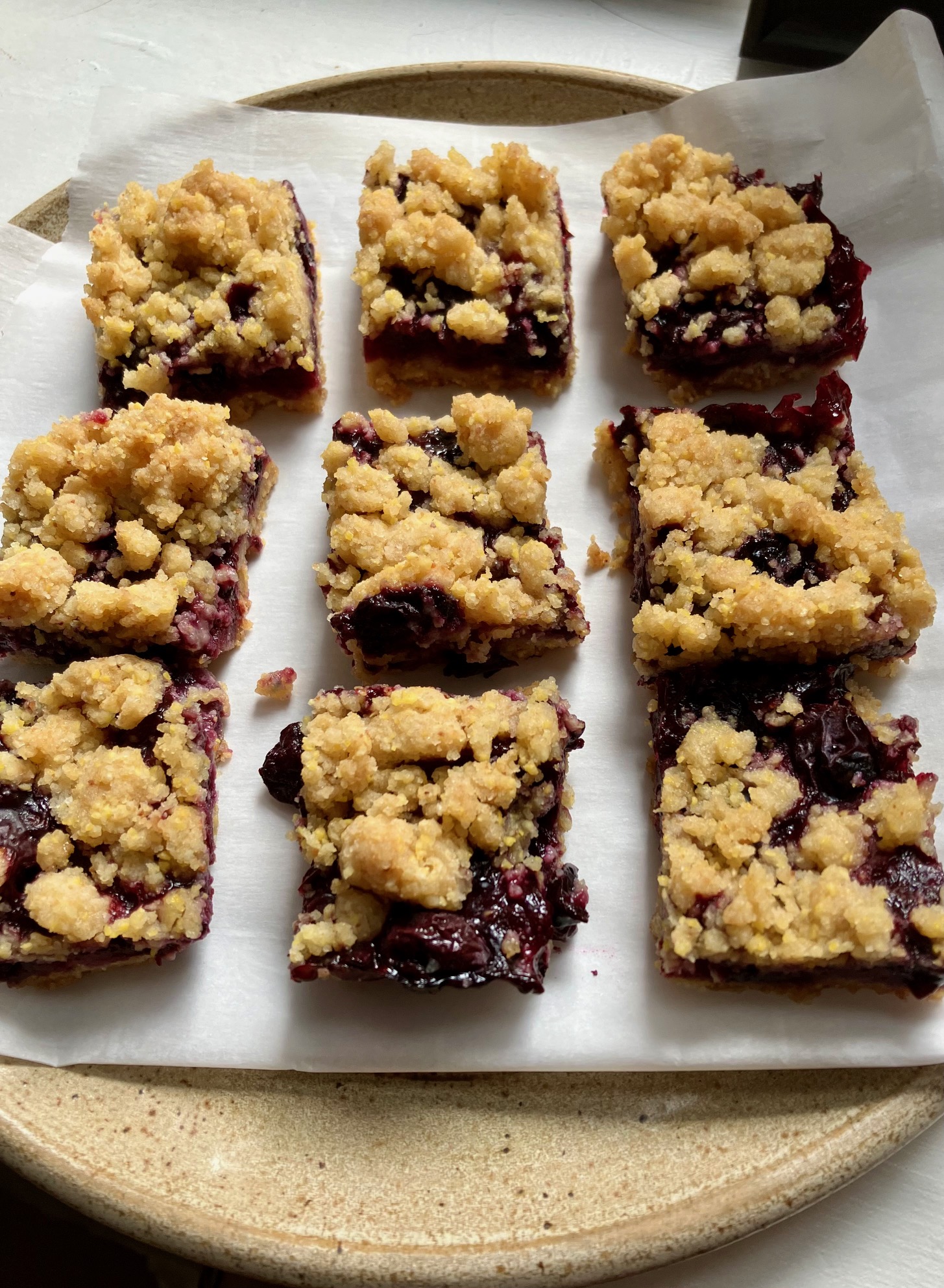 blueberry crumb bars on a plate